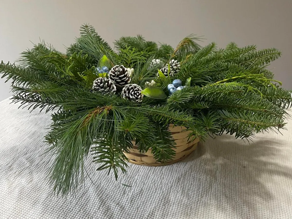 a vase of flowers on a tree